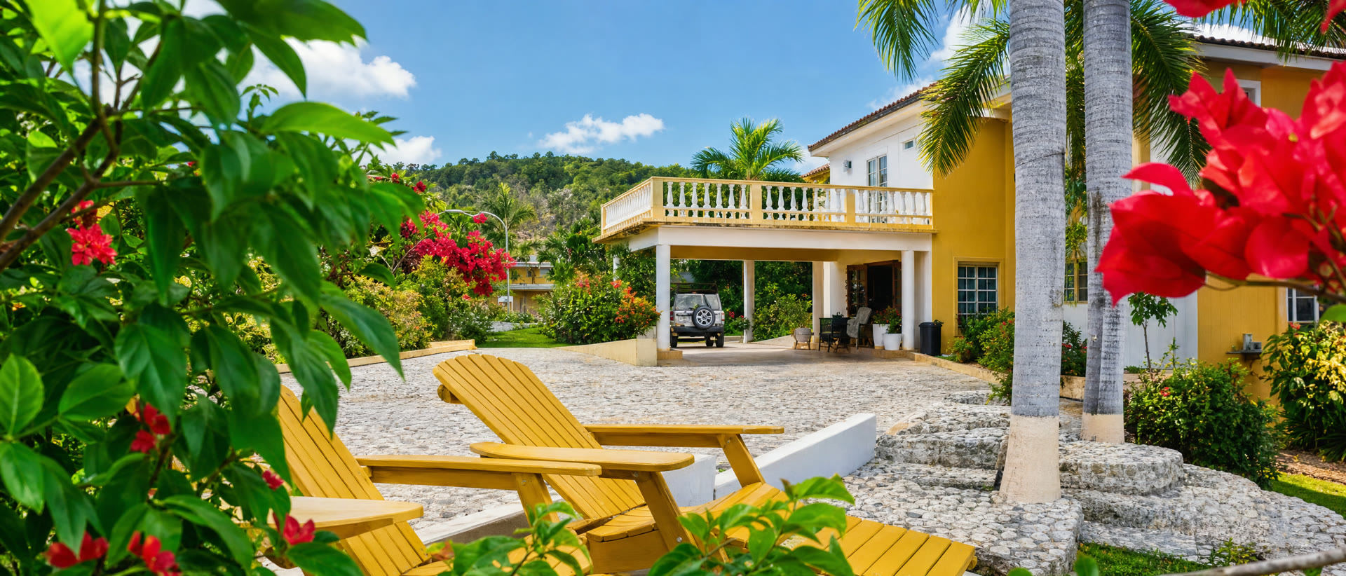 Arrival court — yellow chairs and bougainvillea